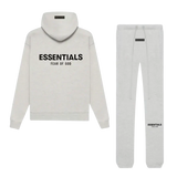 Tuta Essentials con polsini