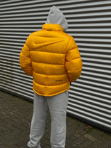 Piumino Nike x NOCTA Sunset Giallo