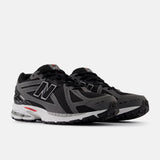 New Balance 1906R Nero Team Red Castlerock