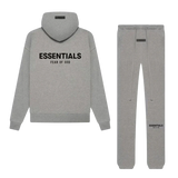 Tuta Essentials con polsini